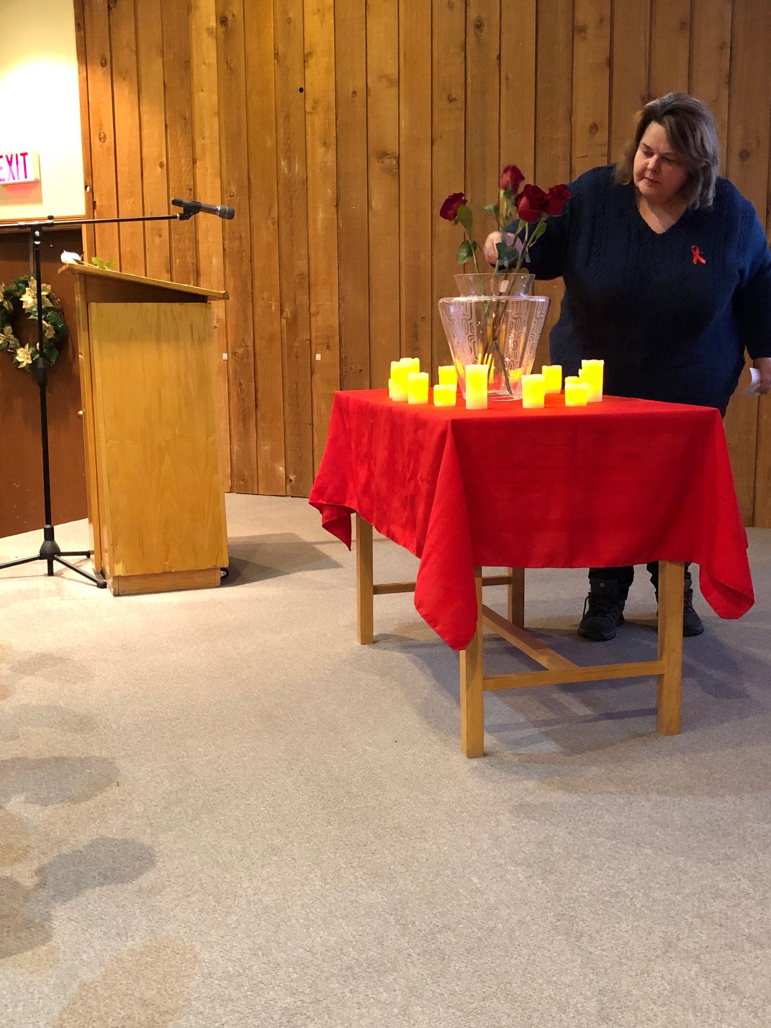 Dawn Skinner, PSAC North Women's Committee, placed a rose in the vase in memory of Anne-Marie Edward 